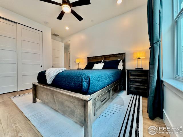 bedroom featuring visible vents, recessed lighting, a ceiling fan, and light wood finished floors