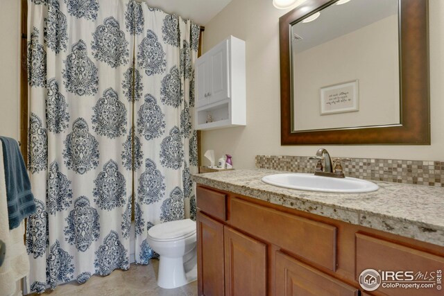 12901 E Idaho Dr, Aurora, CO 80012 - full bathroom with toilet and vanity