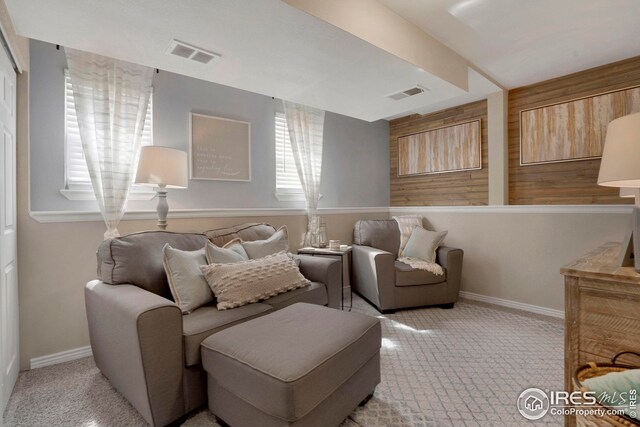 12901 E Idaho Dr, Aurora, CO 80012 - sitting room with light carpet, baseboards, and visible vents