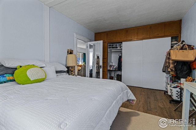 919 State St, Fort Morgan, CO 80701 - bedroom with wood finished floors and a closet