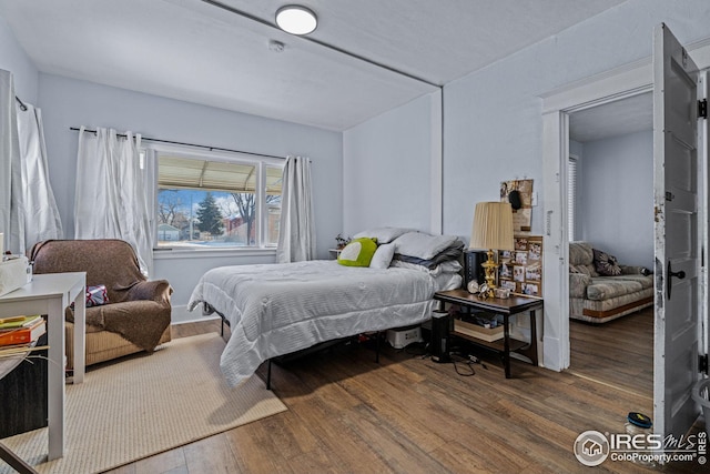 919 State St, Fort Morgan, CO 80701 - bedroom with wood finished floors
