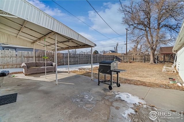919 State St, Fort Morgan, CO 80701 - fenced backyard with a grill and a patio area