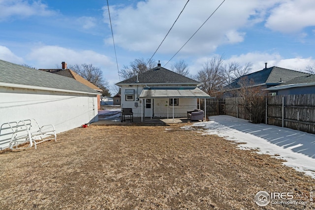 919 State St, Fort Morgan, CO 80701 - back of property with a fenced backyard and a patio