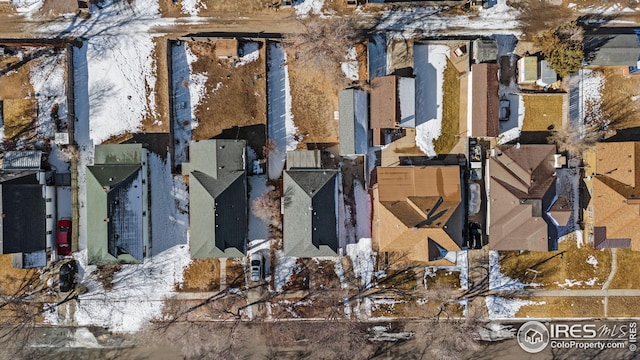 919 State St, Fort Morgan, CO 80701 - snowy aerial view featuring a residential view