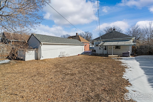 919 State St, Fort Morgan, CO 80701 - view of side of home featuring an outbuilding