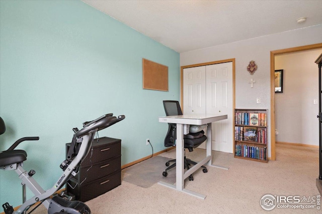1725 67th Ave, Greeley, CO 80634 - home office featuring carpet flooring and baseboards