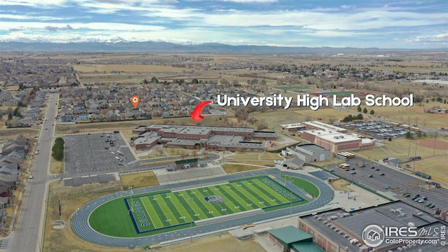 1725 67th Ave, Greeley, CO 80634 - drone / aerial view featuring a mountain view