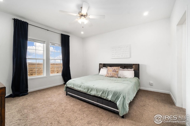 carpeted bedroom with baseboards, ceiling fan, and recessed lighting