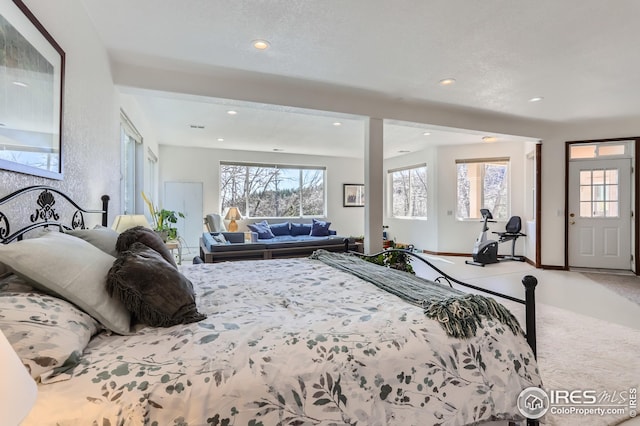 bedroom featuring carpet floors, baseboards, and recessed lighting