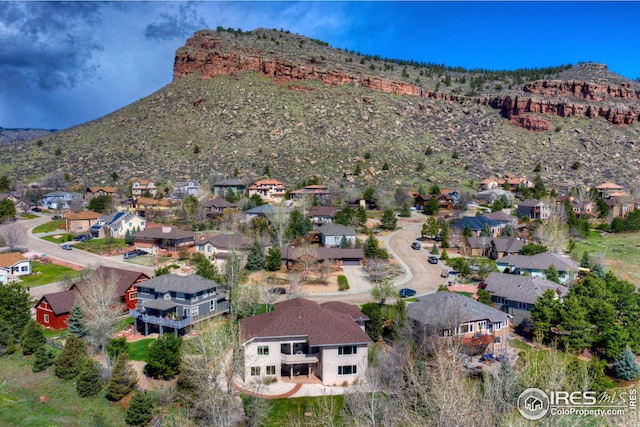 drone / aerial view featuring a mountain view and a residential view