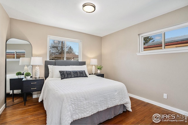 191 Emerald St, Broomfield, CO 80020 - bedroom featuring baseboards and wood finished floors