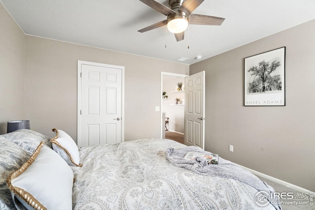 carpeted bedroom with baseboards and a ceiling fan