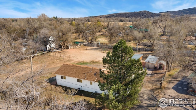 aerial view of sparsely populated area featuring mountains