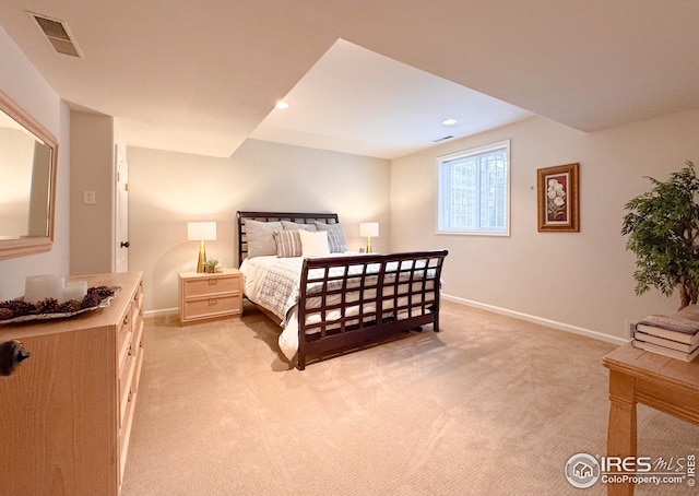 bedroom featuring light colored carpet, baseboards, and recessed lighting