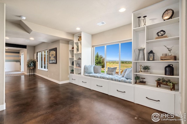 mudroom featuring recessed lighting, visible vents, finished concrete flooring, and baseboards