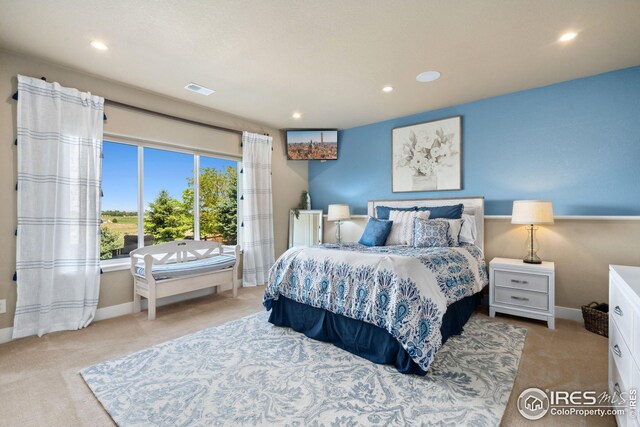 bedroom featuring visible vents, carpet floors, and recessed lighting
