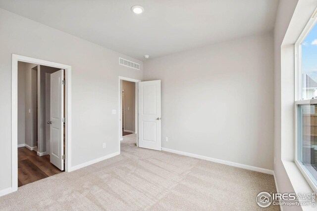 954 Cascade Falls St, Severance, CO 80550 - unfurnished bedroom featuring carpet flooring and baseboards