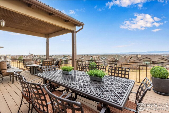 3865 Valley Crest Dr, Timnath, CO 80547 - wooden deck featuring a residential view and outdoor dining area