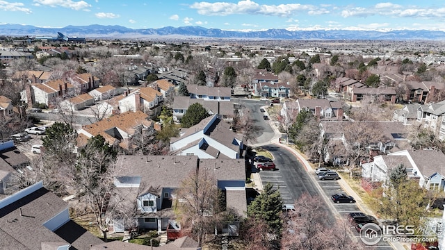 birds eye view of property with a residential view and a mountain view