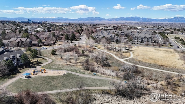 aerial view featuring a mountain view and a residential view