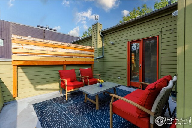 1016 Katy Ln, Longmont, CO 80504 - view of patio / terrace featuring an outdoor living space