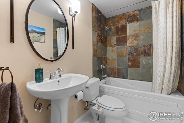 1016 Katy Ln, Longmont, CO 80504 - full bathroom with toilet and shower / bath combo with shower curtain