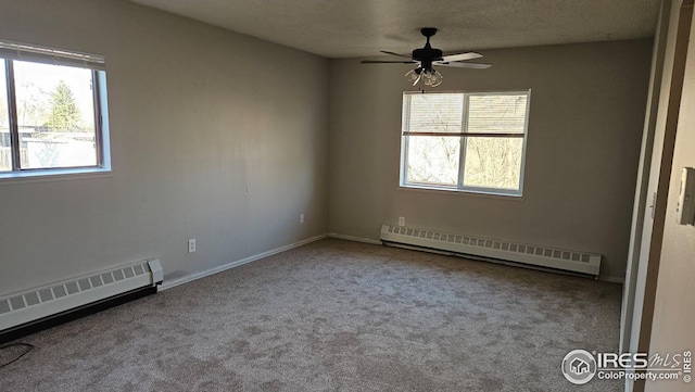 3328 Mcconnell Dr, Laporte, CO 80535 - unfurnished room featuring a wealth of natural light, ceiling fan, and baseboard heating