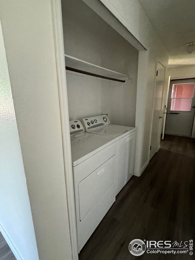 3328 Mcconnell Dr, Laporte, CO 80535 - laundry room with dark wood-type flooring, washing machine and dryer, and laundry area