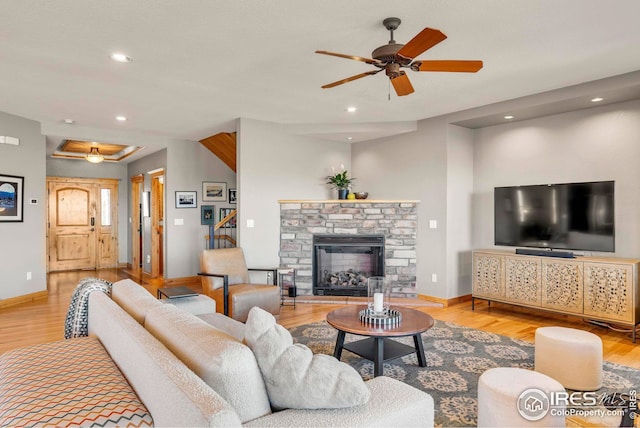 living room with baseboards, recessed lighting, wood finished floors, and ceiling fan