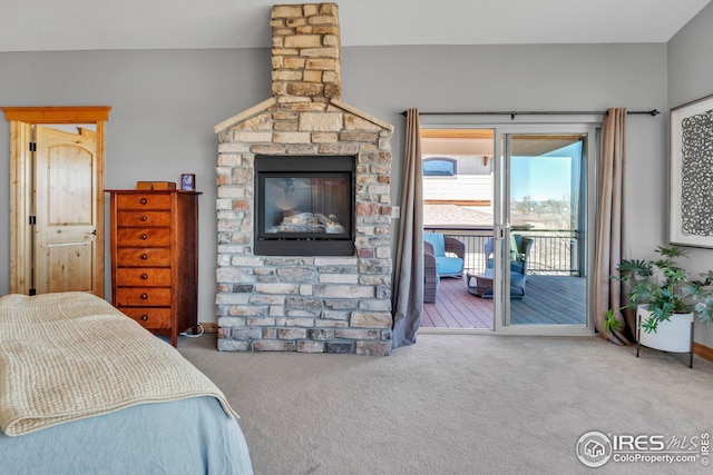 carpeted bedroom with access to outside