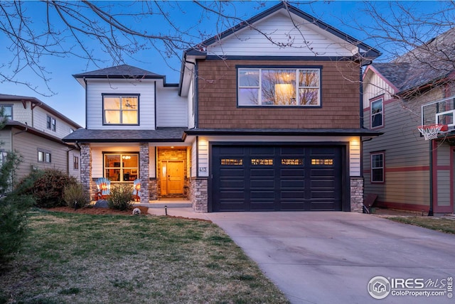 craftsman-style house with a garage, a porch, concrete driveway, and stone siding