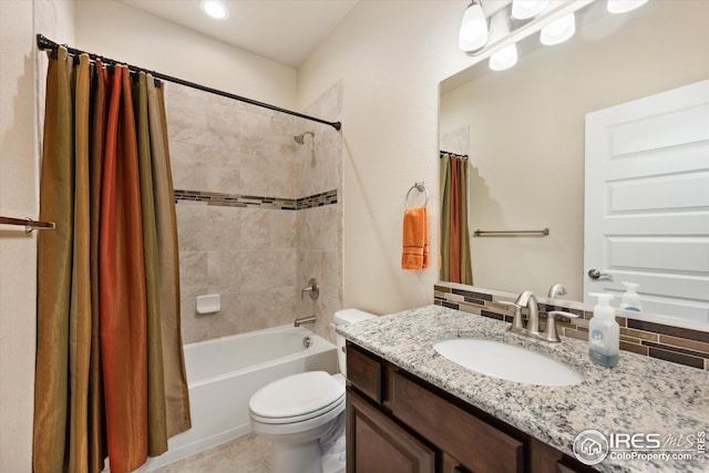 full bath with toilet, shower / tub combo with curtain, and vanity