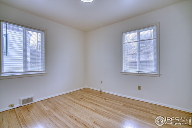 325 27th St, Boulder, CO 80305 - unfurnished room featuring wood finished floors, baseboards, and visible vents