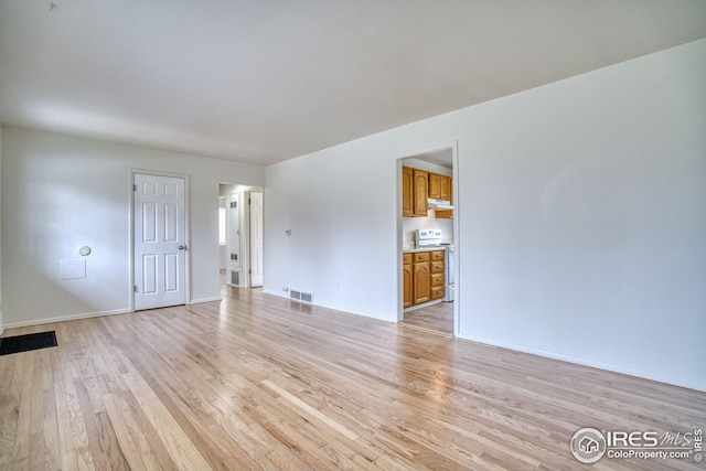 325 27th St, Boulder, CO 80305 - unfurnished living room featuring baseboards, light wood finished floors, and visible vents