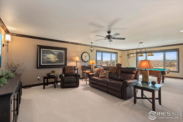 living room with pool table, light colored carpet, ceiling fan, and ornamental molding