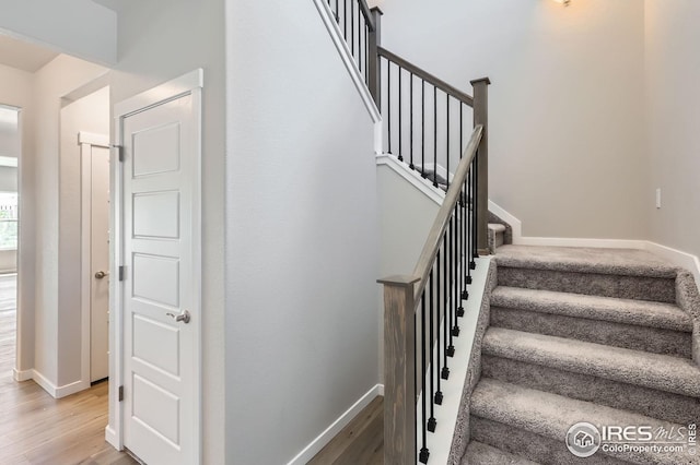 786 Griffith St, Lochbuie, CO 80603 - staircase featuring wood finished floors and baseboards
