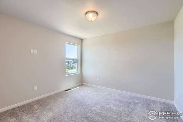 786 Griffith St, Lochbuie, CO 80603 - carpeted empty room featuring baseboards