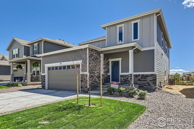 786 Griffith St, Lochbuie, CO 80603 - view of front facade with stone siding, board and batten siding, concrete driveway, a garage, and cooling unit
