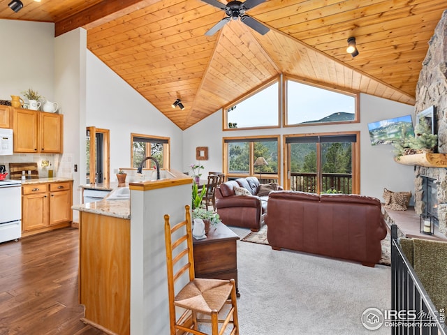 kitchen featuring dark wood-style flooring, white appliances, open floor plan, ceiling fan, and wood ceiling