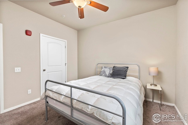 bedroom featuring baseboards, carpet flooring, and a ceiling fan