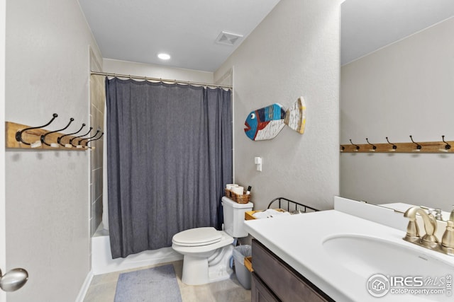 bathroom with toilet, vanity, and shower / bath combination with curtain