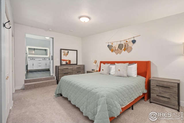 carpeted bedroom with baseboards