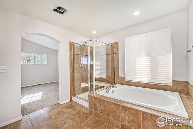 bathroom with a garden tub, a shower stall, visible vents, and tile patterned floors