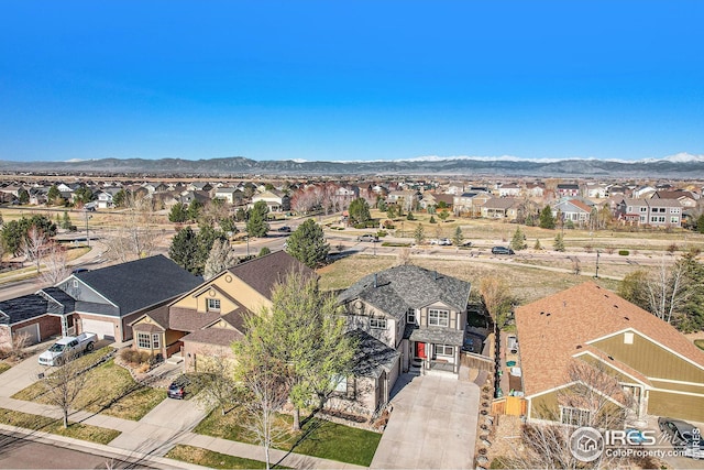 aerial view with a mountain view and a residential view