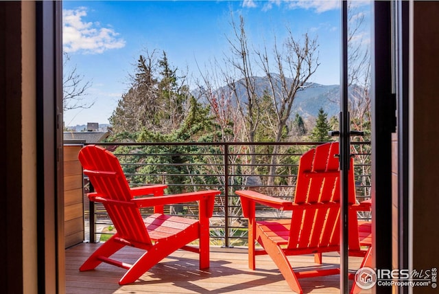 balcony featuring a mountain view
