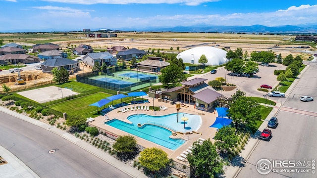 bird's eye view with a mountain view and a residential view