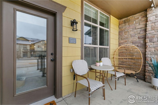 property entrance with covered porch