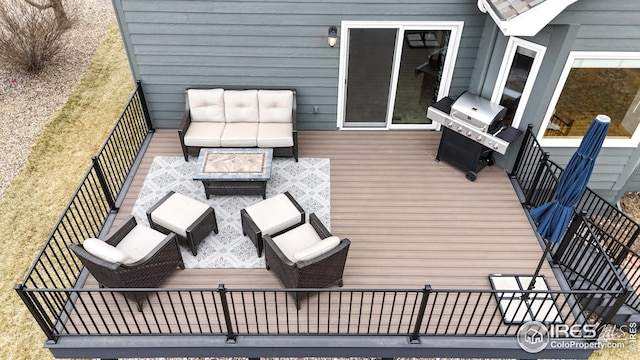 wooden terrace featuring grilling area