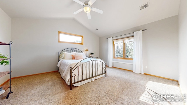 bedroom featuring baseboards, lofted ceiling, visible vents, and carpet floors