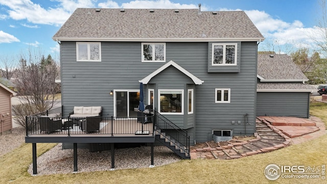 rear view of property with a yard, a shingled roof, central AC, and a wooden deck